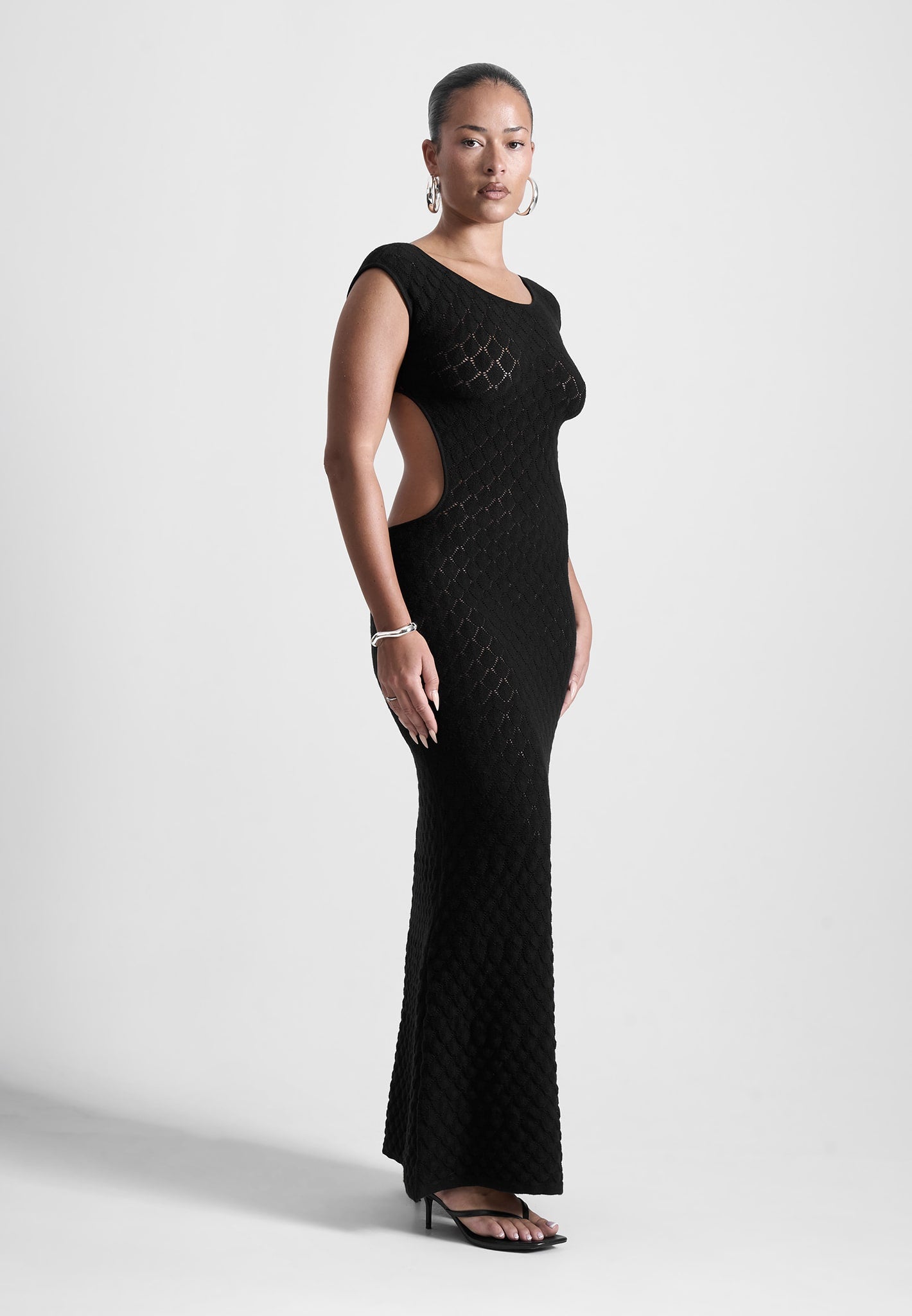 cut-out-shell-knit-maxi-dress-in-black